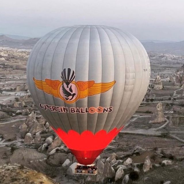 Cappadocia: Fairy Chimneys Sunrise Hot Air Balloon Flight - Landing, champagne-style toast, and your certificate keepsake