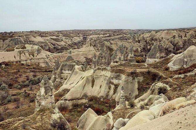 Cappadocia Green Tour With Underground City and Ihlara Valley - Pigeon Valley and Meryem Ana Kilisesi: cliffs for photos, church for context