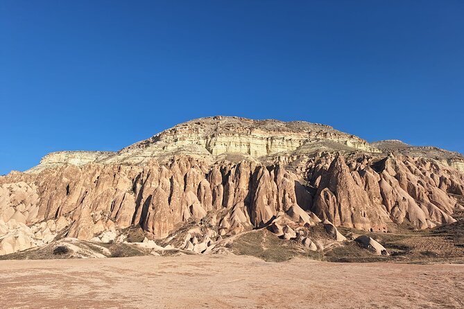 Cappadocia Highlights Tour with Guided Yoga Session - Avanos lunch break and the route toward Açıksaray Open Palace