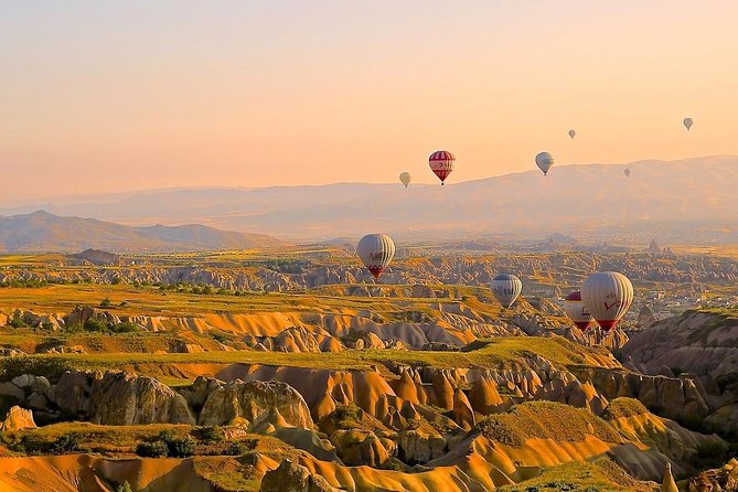 Cappadocia Hot Air Balloon Ride with Transfers - Goreme National Park Stop: Cave Churches, Chimney Rocks, and UNESCO Vibes