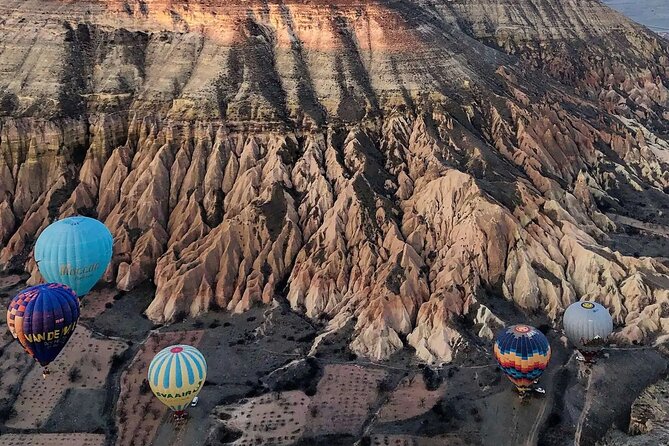 Cappadocia Hot Air Balloon with Pickup, Breakfast & Champagne - Hotel pickup and the early-morning reality