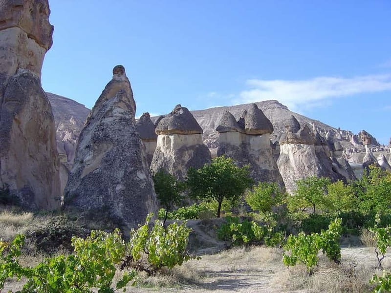 Cappadocia: Red Tour with Lunch & Pottery Demonstration - Love Valley: quick photo time, giant forms, and a reality check