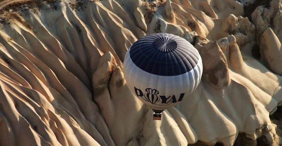 Cappadocia: Royal Queen Hot Air Balloon Tour at Sunrise - The Flight Itself: 300 Meters Up, Then Floating Over Valleys and Rock Formations