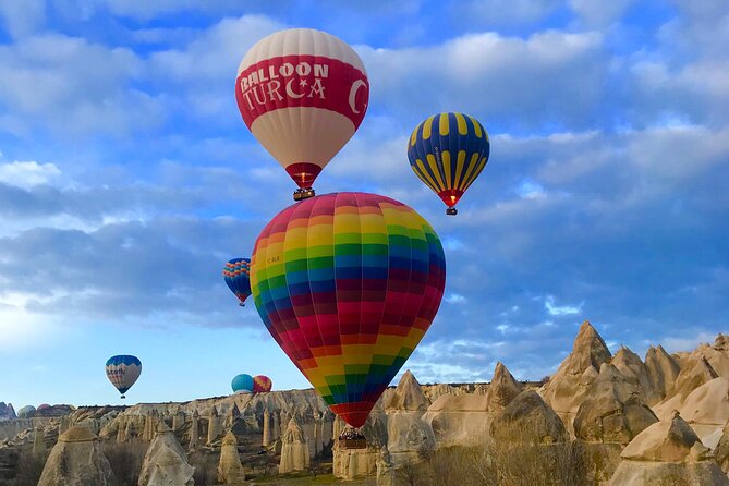 Cappadocia Sunrise Hot Air Balloon Flight with Transfers - Over Red Valley: start with color and formation views