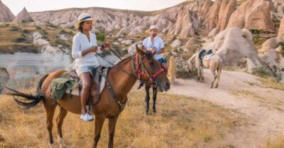 Sunset Horse Trek Through the Valleys