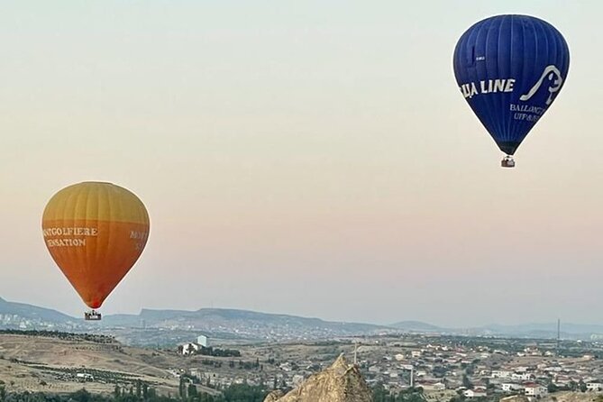 Cat Valley Ballon Tour In Cappadocia With Free Hotel Transfer - Stop 3 landing in Göreme: certificates and a non-alcoholic toast