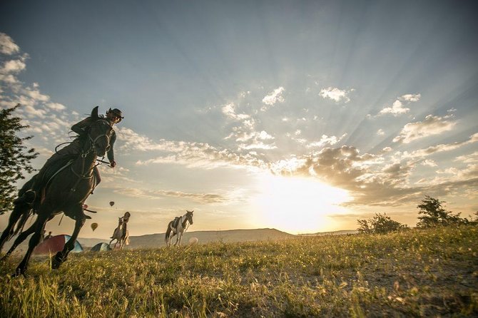 Horse Riding in Cappadocia in fairy chimeys - Sunset Point photo time at the end of the ride