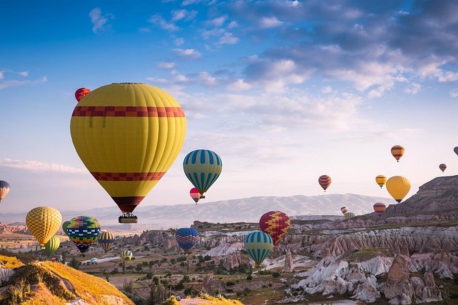 Sunrise Hot Air Balloon Flight Over Göreme & Fairy Chimneys - Fairy chimneys from above: what 55 minutes to 1 hour feels like